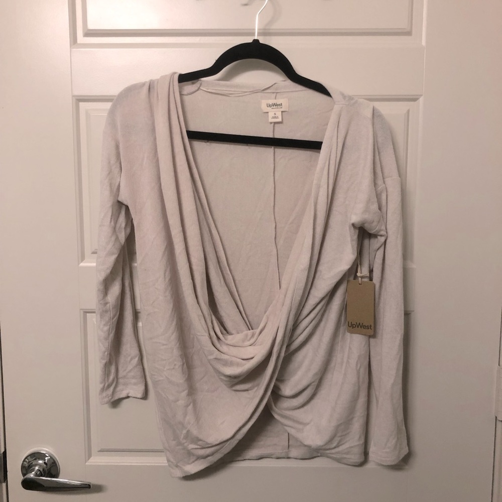 Cream colored cross sweater